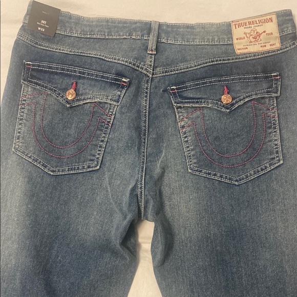 True Religion, Joey Jeans with Pink Stitching. Mid Rise Flare. Medium Frost Blue - Picture 1 of 13